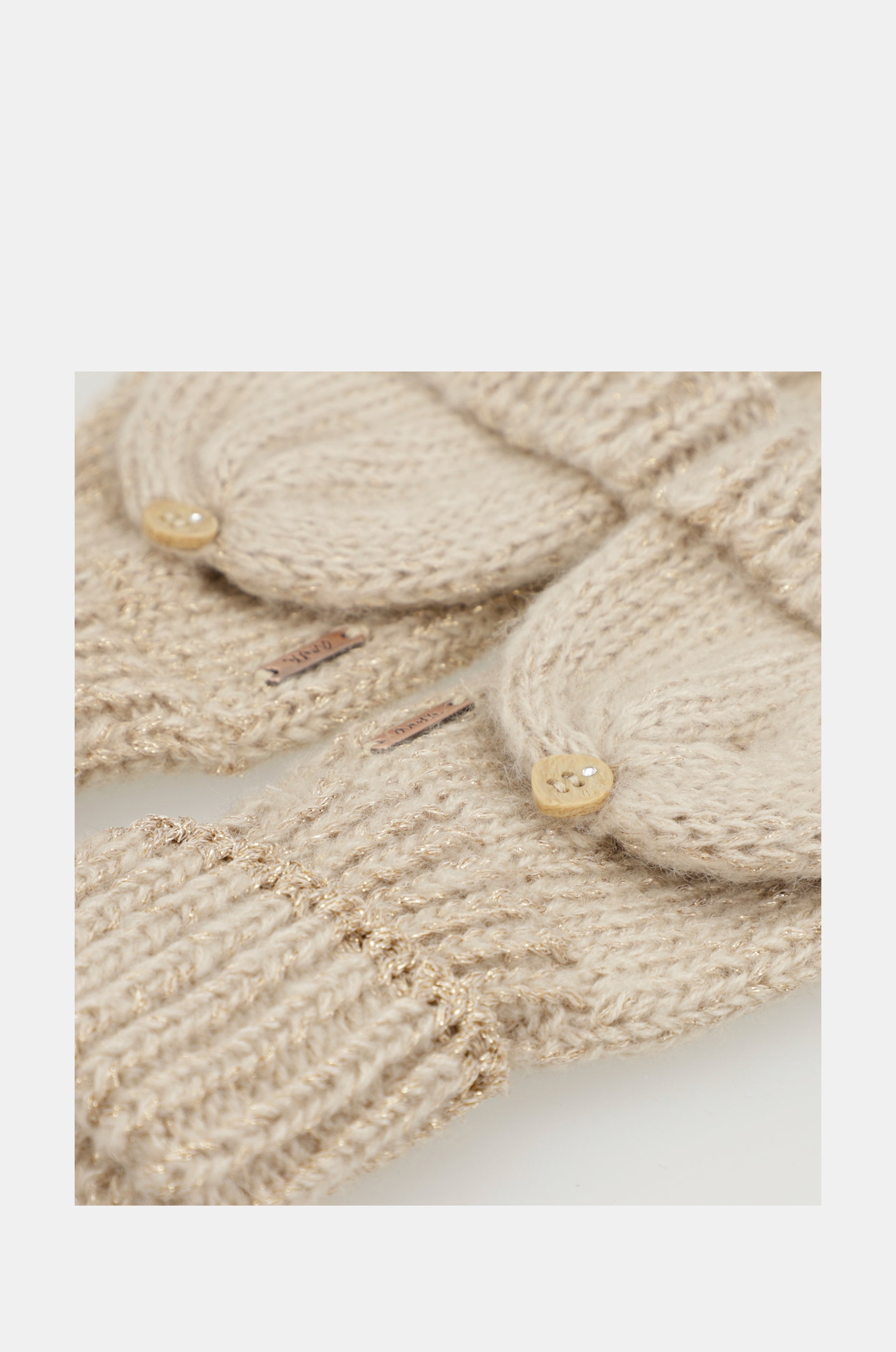 Mitones logo beige