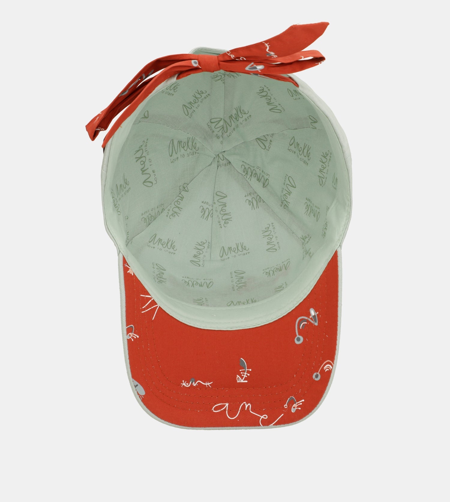 Gorra verde lazo rojo