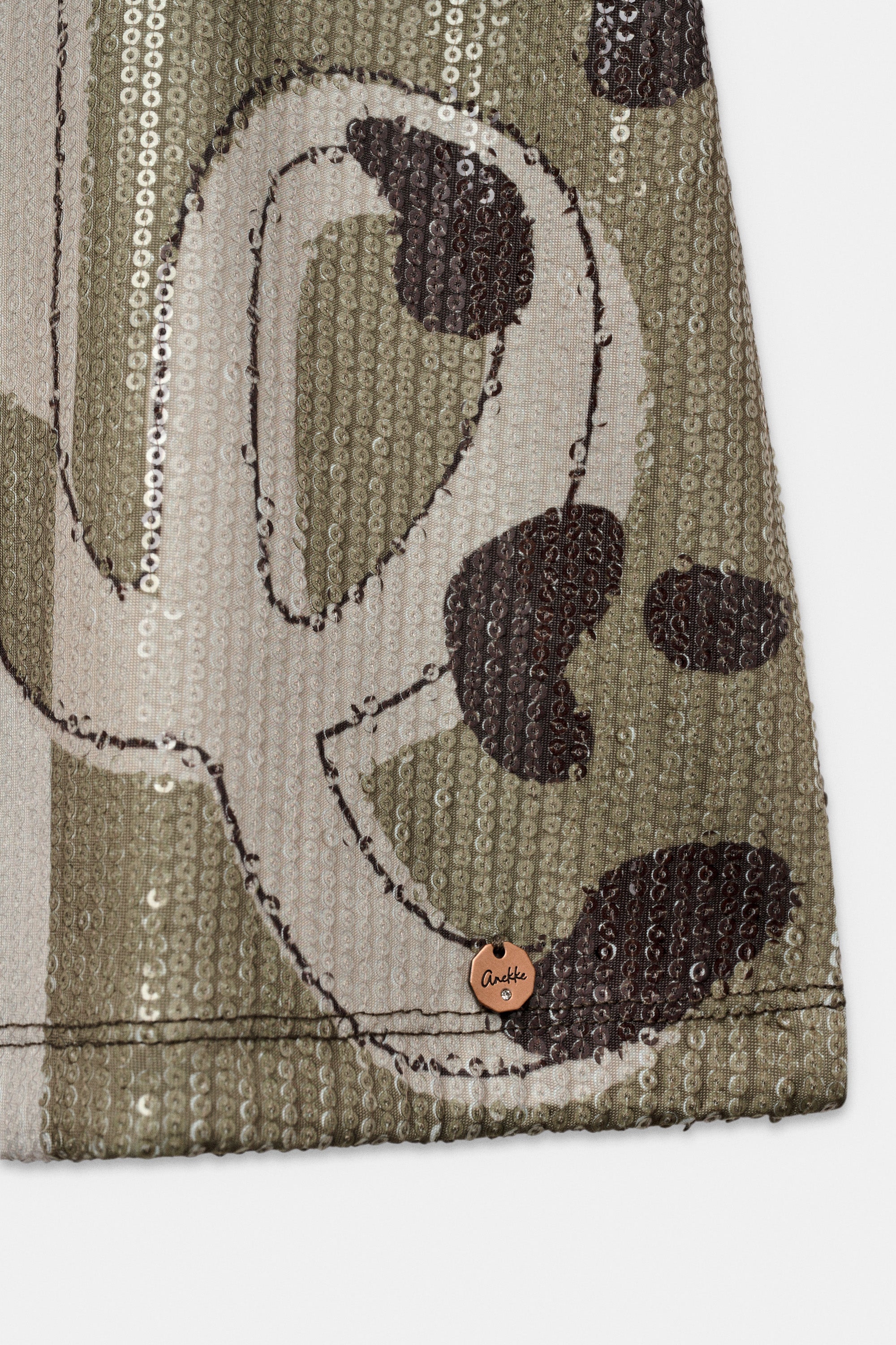 Camiseta beige con lentejuelas