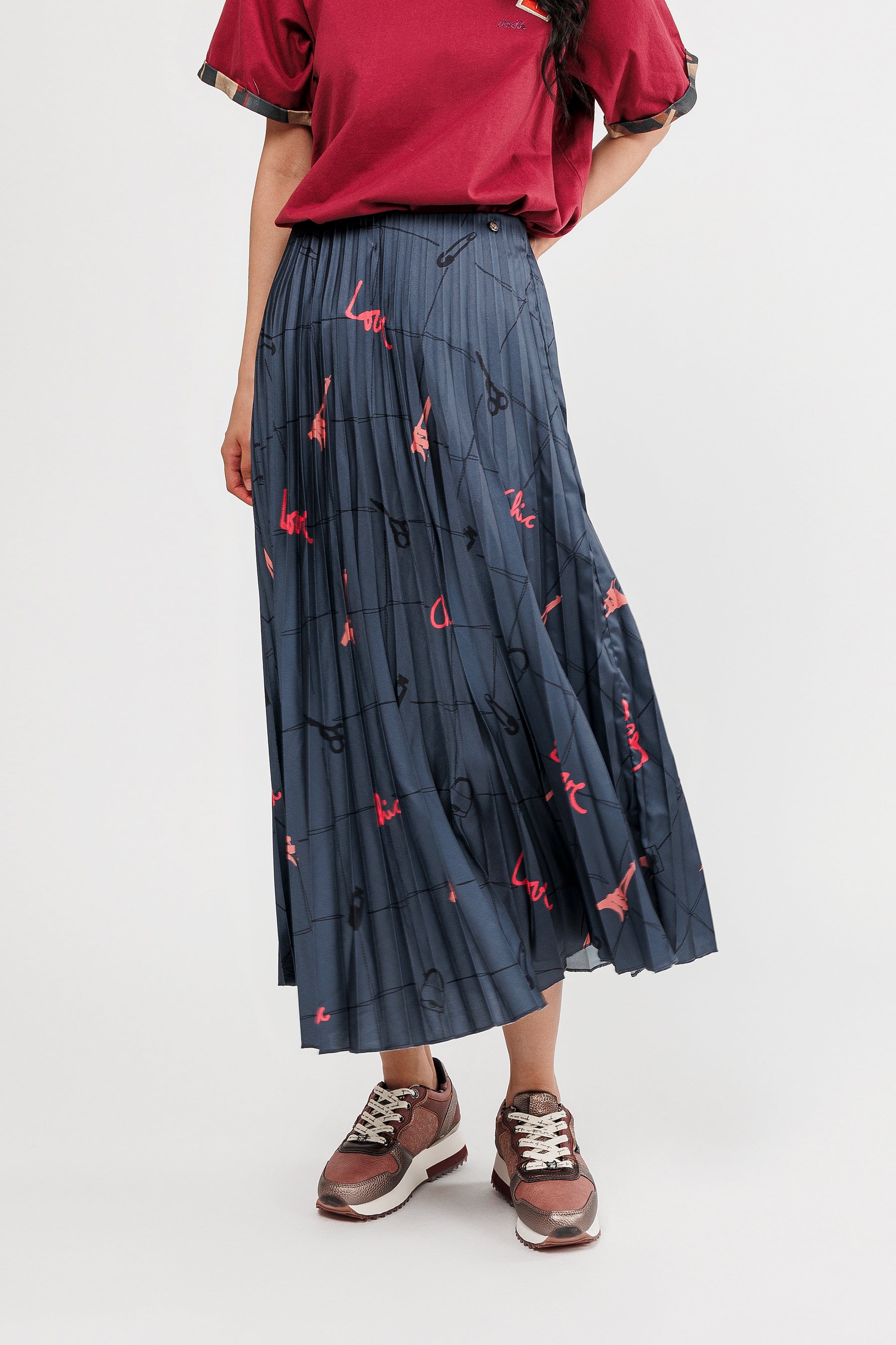 Falda plisada azul estampada