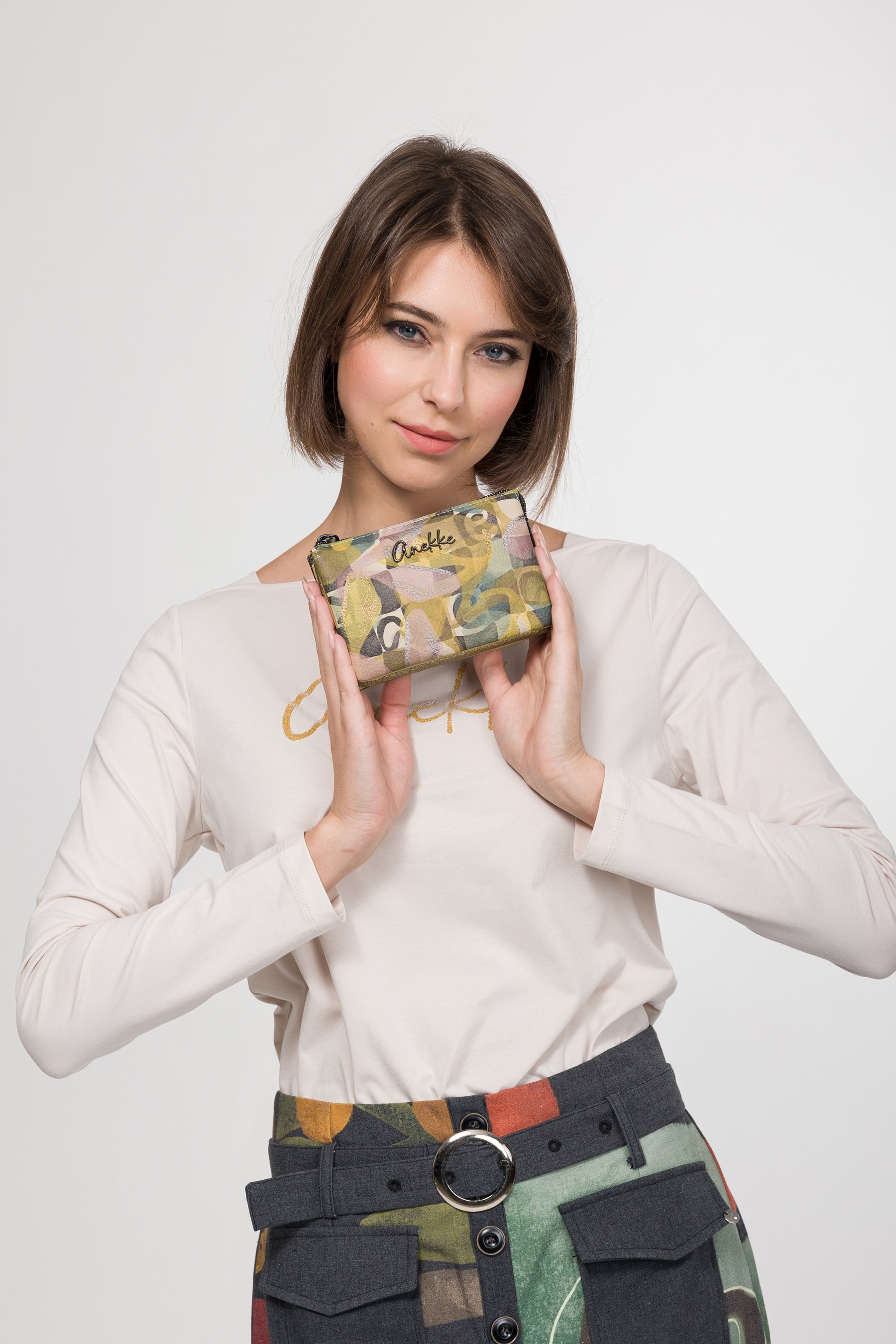 Monedero triple compartimento Bloom