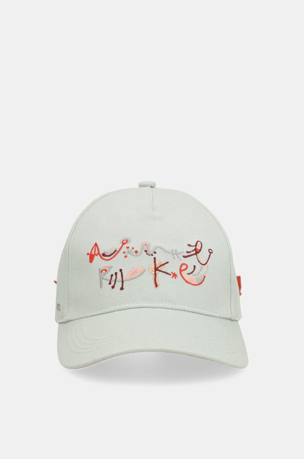 Gorra verde lazo rojo