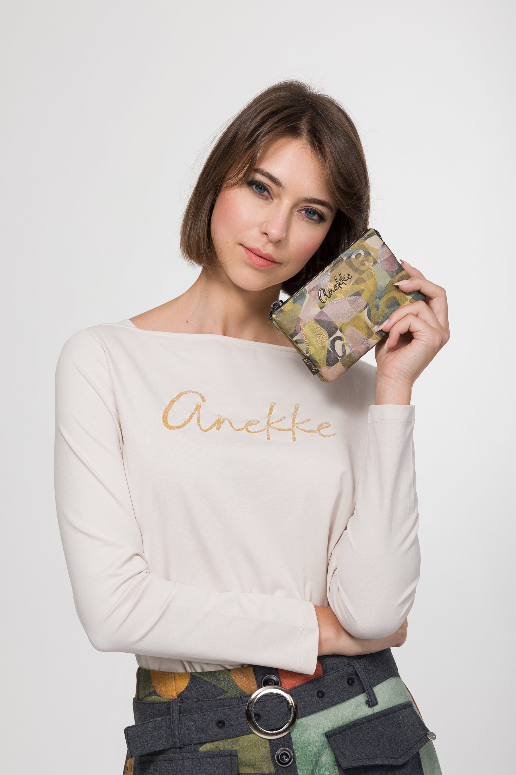 Monedero triple compartimento Bloom